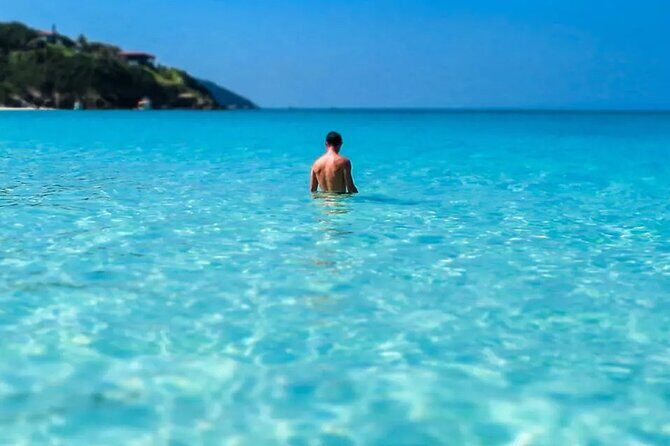 A Day in Arraial do Cabo Guided Tour - Praia do Forno: blue-green water with Atlantic Forest vibes