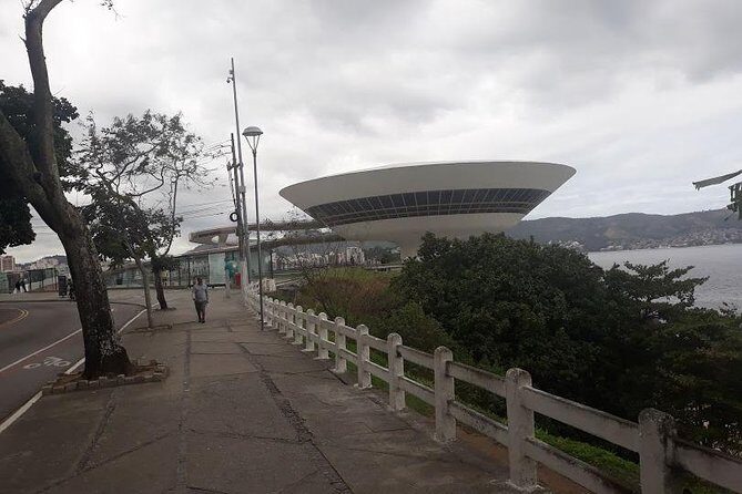 Private Niterói City Tour- MAC Art Museum,Santa Cruz Fortress Parque da Cidade - São Francisco Beach: calm daytime water and lively night energy